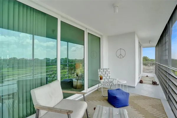 a bedroom with a bed and a table