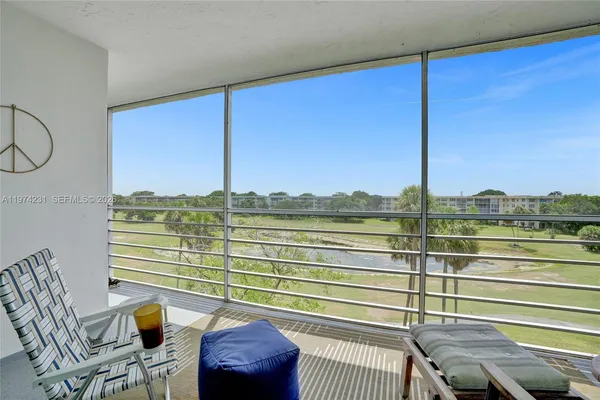 a bathroom with a sink a mirror and a toilet