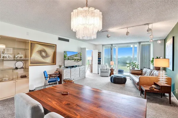 a view of a dining room with furniture