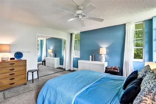 a room with furniture and a flat screen tv