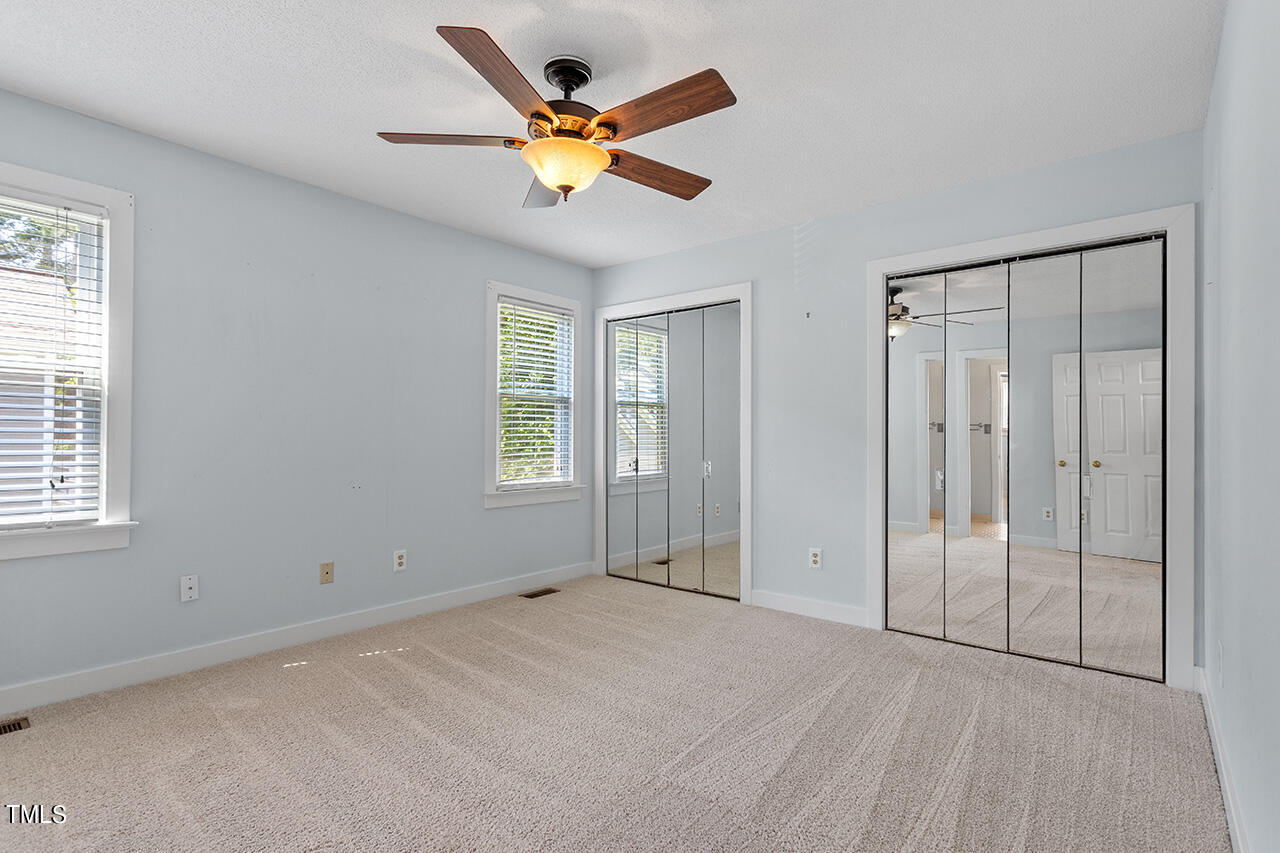 1433 Quarter Point Raleigh, NC 27615 - Photo 22 of 27 a view of an empty room with a window