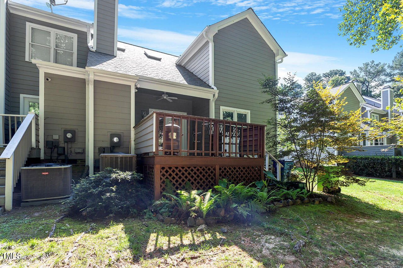1433 Quarter Point Raleigh, NC 27615 - Photo 25 of 27 a front view of a house with garden