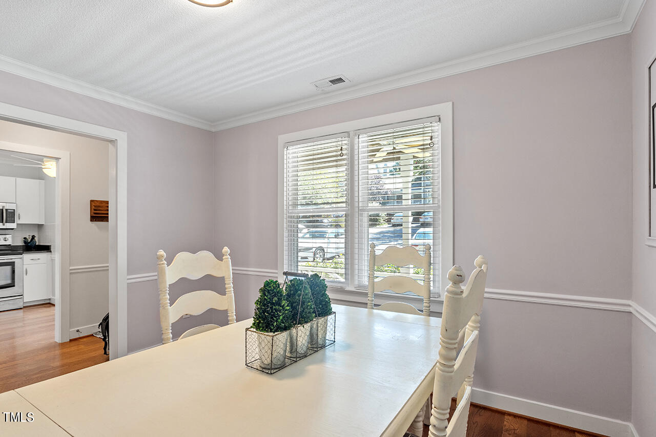 1433 Quarter Point Raleigh, NC 27615 - Photo 4 of 27 a view of a room with a large window