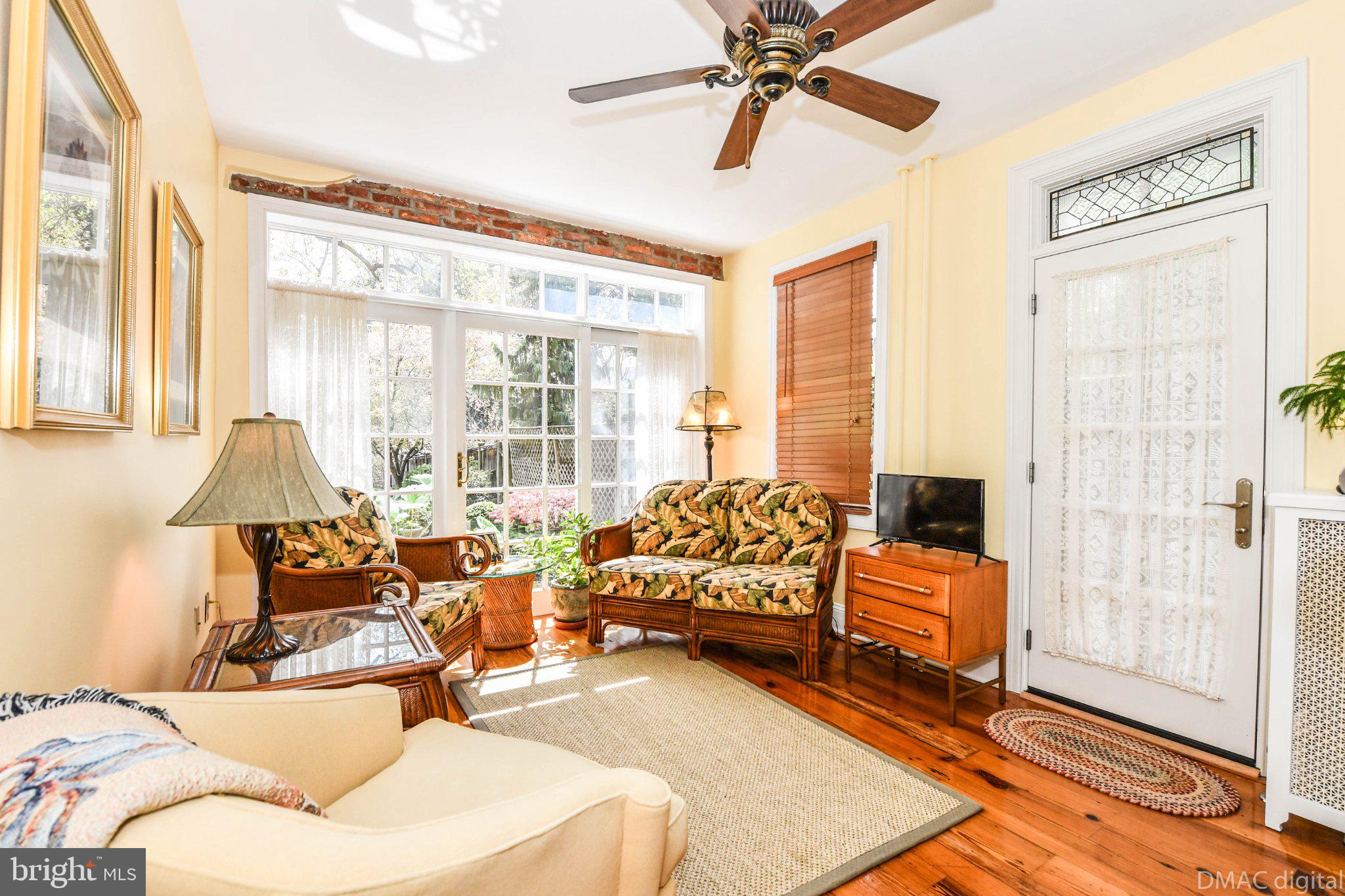 106 West 3rd Street Frederick, MD 21701 - Photo 11 of 46 a living room with furniture and a large window