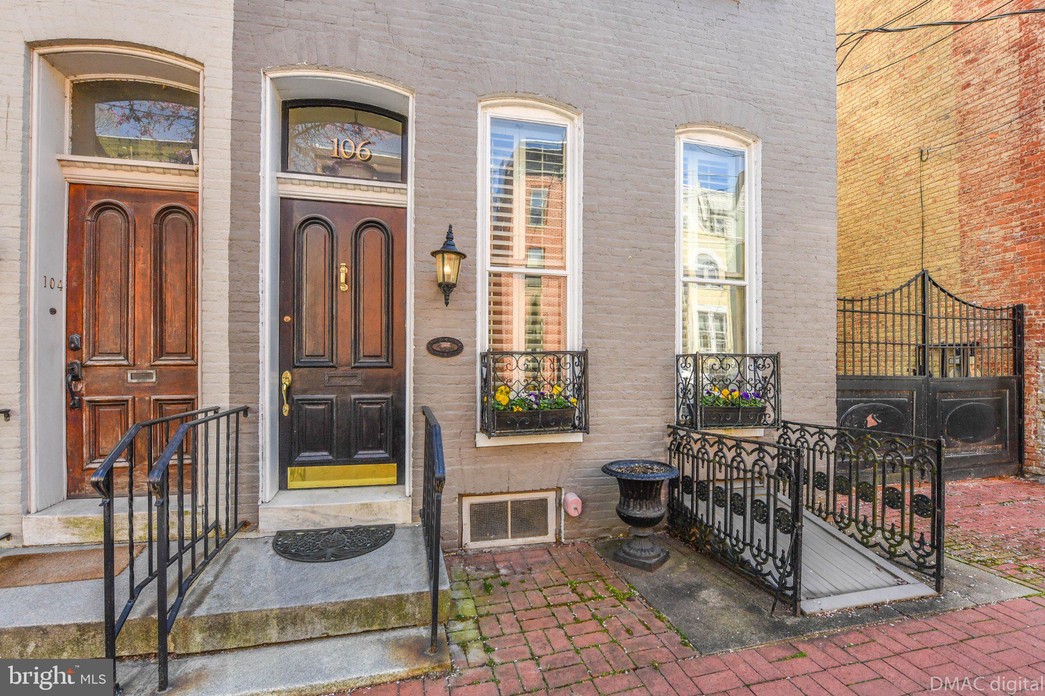 106 West 3rd Street Frederick, MD 21701 - Photo 45 of 46 a balcony view with a fireplace and a rug