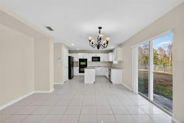 a view of a living room and window