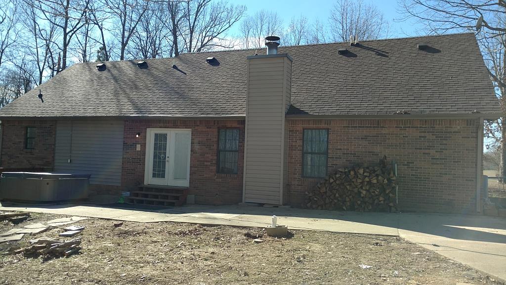 4859 Marion Road Cunningham, TN 37052 - Photo 3 of 10 a house that has a tree in front of it