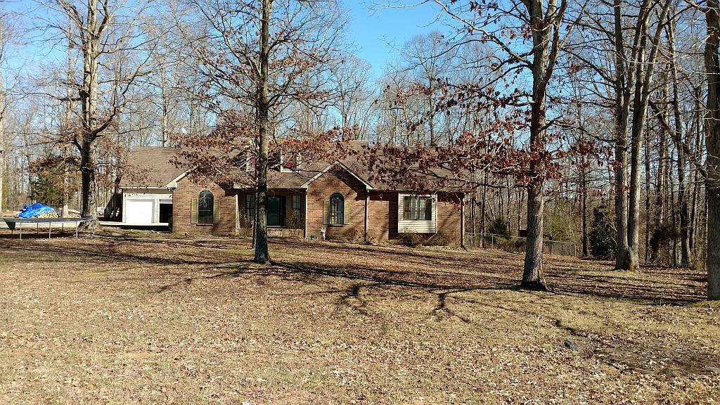 4859 Marion Road Cunningham, TN 37052 - Photo 5 of 10 a view of a house with a yard
