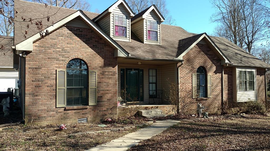 4859 Marion Road Cunningham, TN 37052 - Photo 6 of 10 a front view of a house