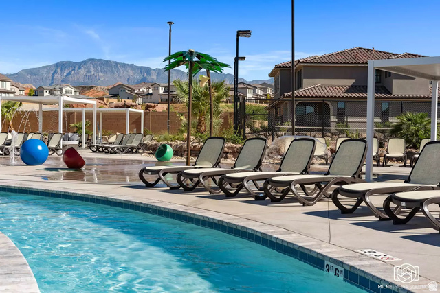 1166 North Riviera Alley Washington, UT 84780 - Photo 22 of 26 Community pool with a patio area, a residential view, and a mountain view