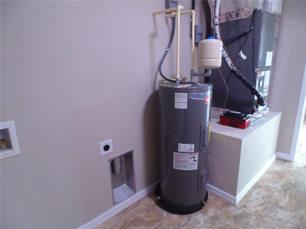 10856 Southwest 79th Avenue Ocala, FL 34476 - Photo 21 of 33 a view of water heater room