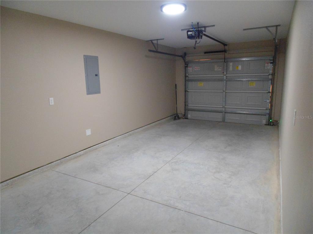 10856 Southwest 79th Avenue Ocala, FL 34476 - Photo 22 of 33 a view of a livingroom with an empty space and a ceiling fan