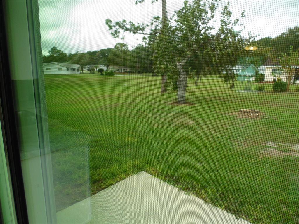 10856 Southwest 79th Avenue Ocala, FL 34476 - Photo 23 of 33 a view of grassy field with grass