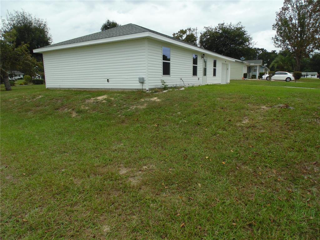 10856 Southwest 79th Avenue Ocala, FL 34476 - Photo 28 of 33 a view of a backyard of the house