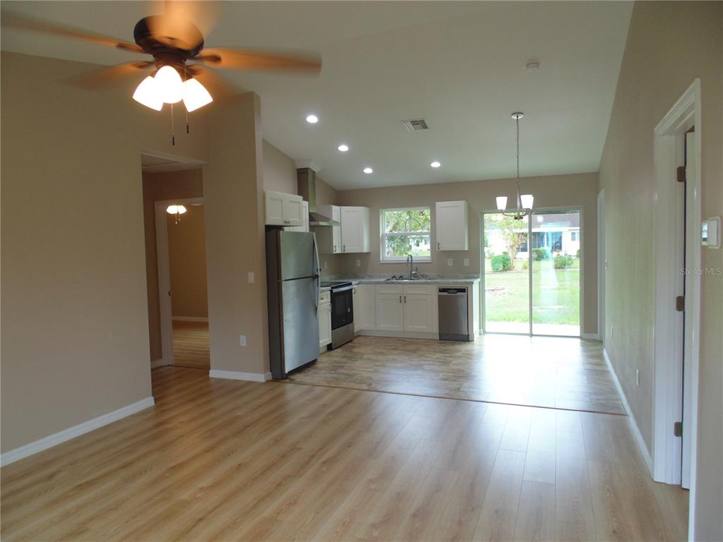 10856 Southwest 79th Avenue Ocala, FL 34476 - Photo 3 of 33 a view of a kitchen with an empty space and a window