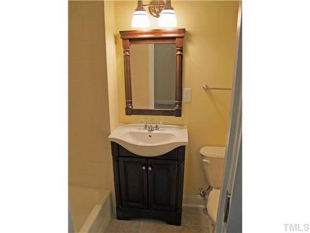 1706 Euclid Road Durham, NC 27713 - Photo 13 of 25 Master Bathroom with Updates including NEW Vanity and Tile Floors.