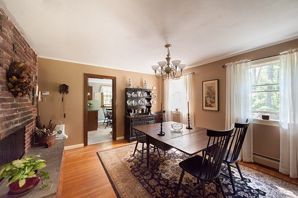 31 Chapman Road Boxford, MA 01921 - Photo 11 of 27 a view of a dining room with furniture window and wooden floor