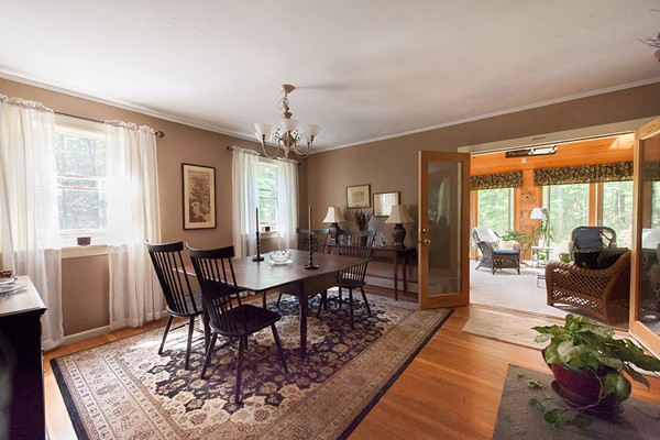 31 Chapman Road Boxford, MA 01921 - Photo 10 of 27 a view of a dining room with furniture window and wooden floor