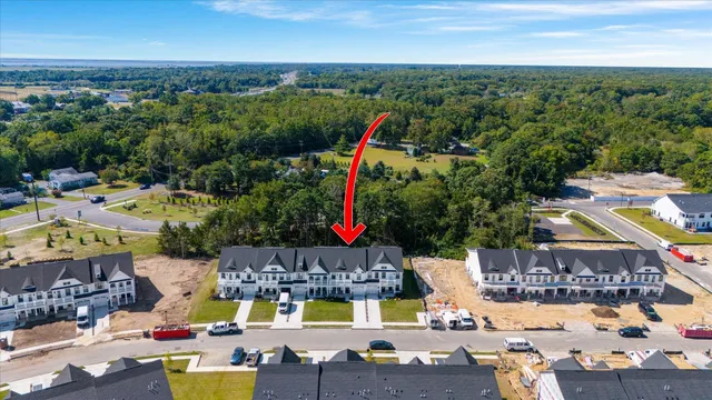 a view of swimming pool with outdoor seating and city view