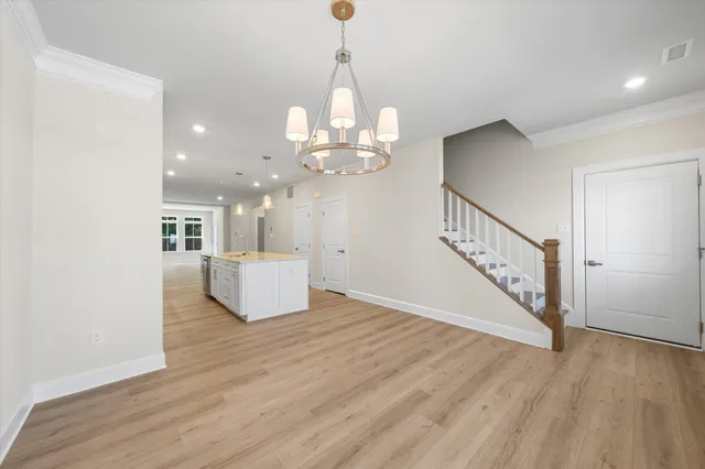 a view of a livingroom with wooden floor