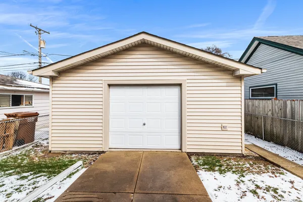 a front view of a house with a garage