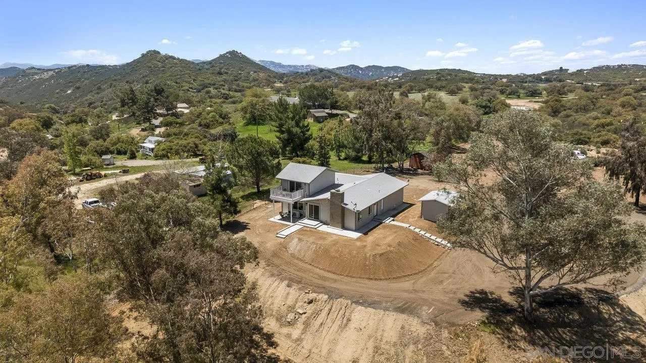 23471 Japatul Valley Road Alpine, CA 91901 - Photo 1 of 57 an aerial view of a house with mountain view