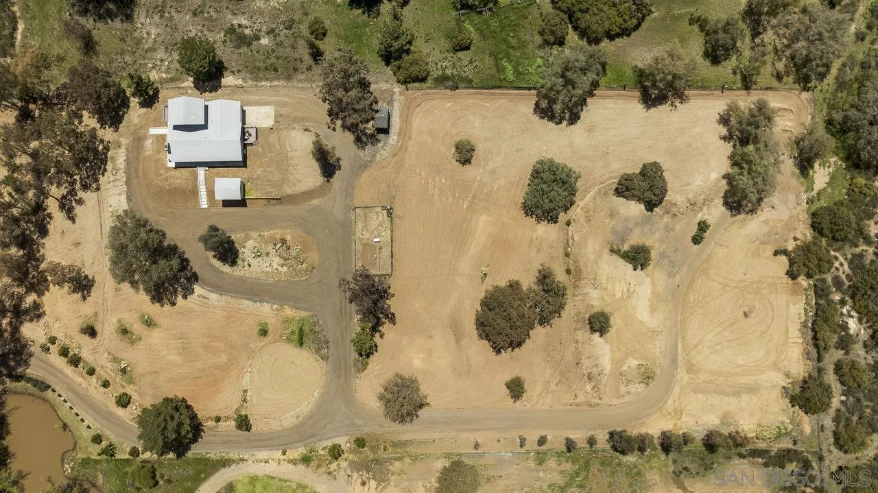 23471 Japatul Valley Road Alpine, CA 91901 - Photo 2 of 57 a bathroom with a bathtub and shower