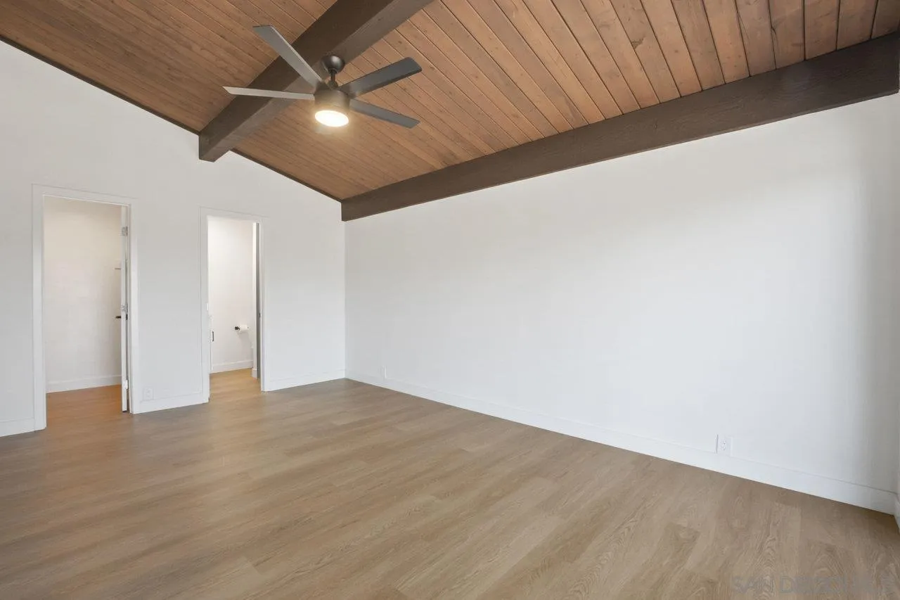 23471 Japatul Valley Road Alpine, CA 91901 - Photo 21 of 57 a view of an empty room with wooden floor