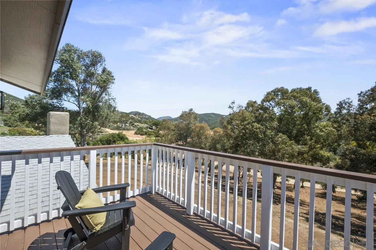 23471 Japatul Valley Road Alpine, CA 91901 - Photo 33 of 57 a view of a chair and table on the roof deck
