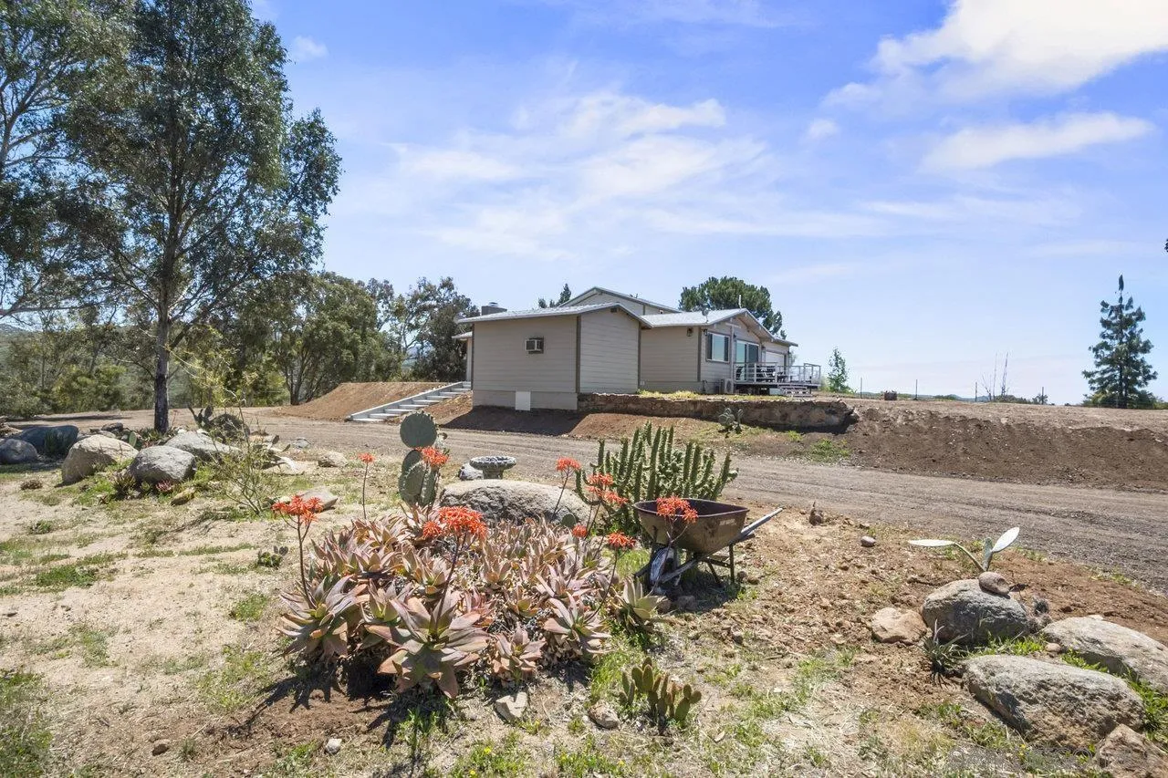 23471 Japatul Valley Road Alpine, CA 91901 - Photo 38 of 57 a view of a terrace with sitting area