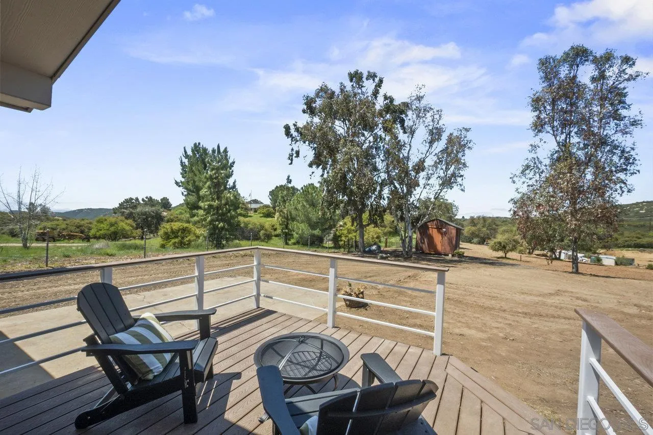 23471 Japatul Valley Road Alpine, CA 91901 - Photo 39 of 57 a view of a chairs and table on the terrace