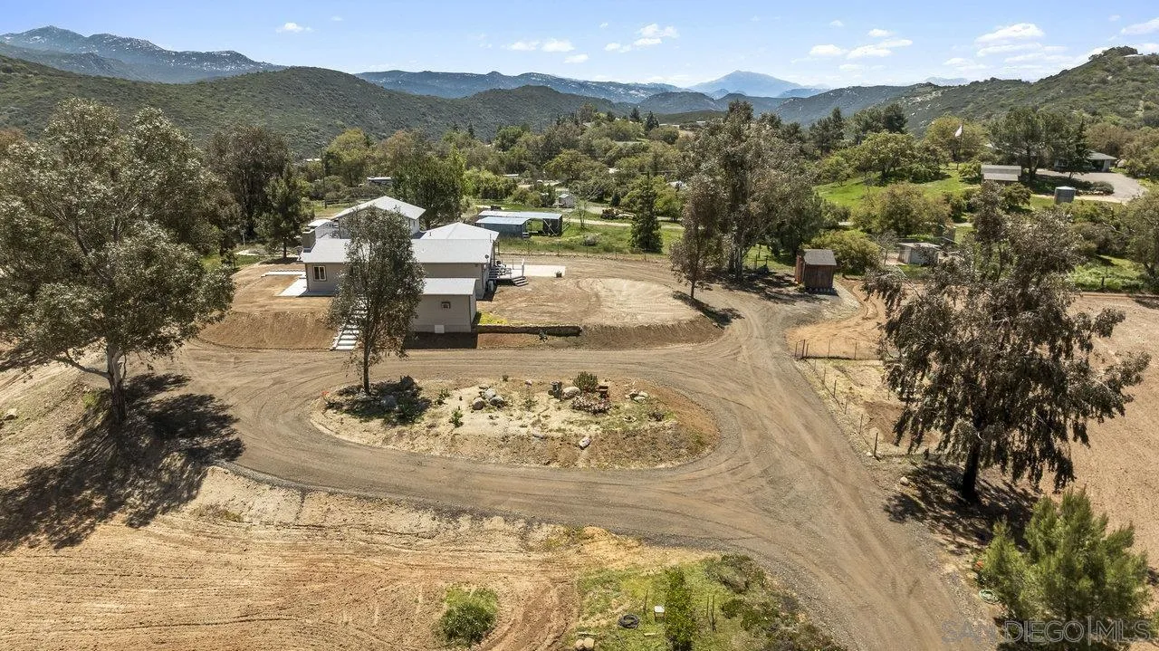 23471 Japatul Valley Road Alpine, CA 91901 - Photo 4 of 57 a view of a town with mountains in the background