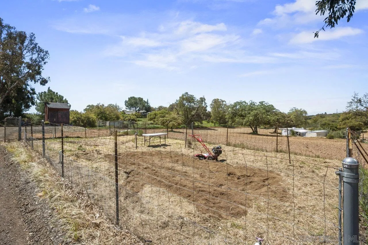 23471 Japatul Valley Road Alpine, CA 91901 - Photo 41 of 57 a view of a dry yard with wooden fence