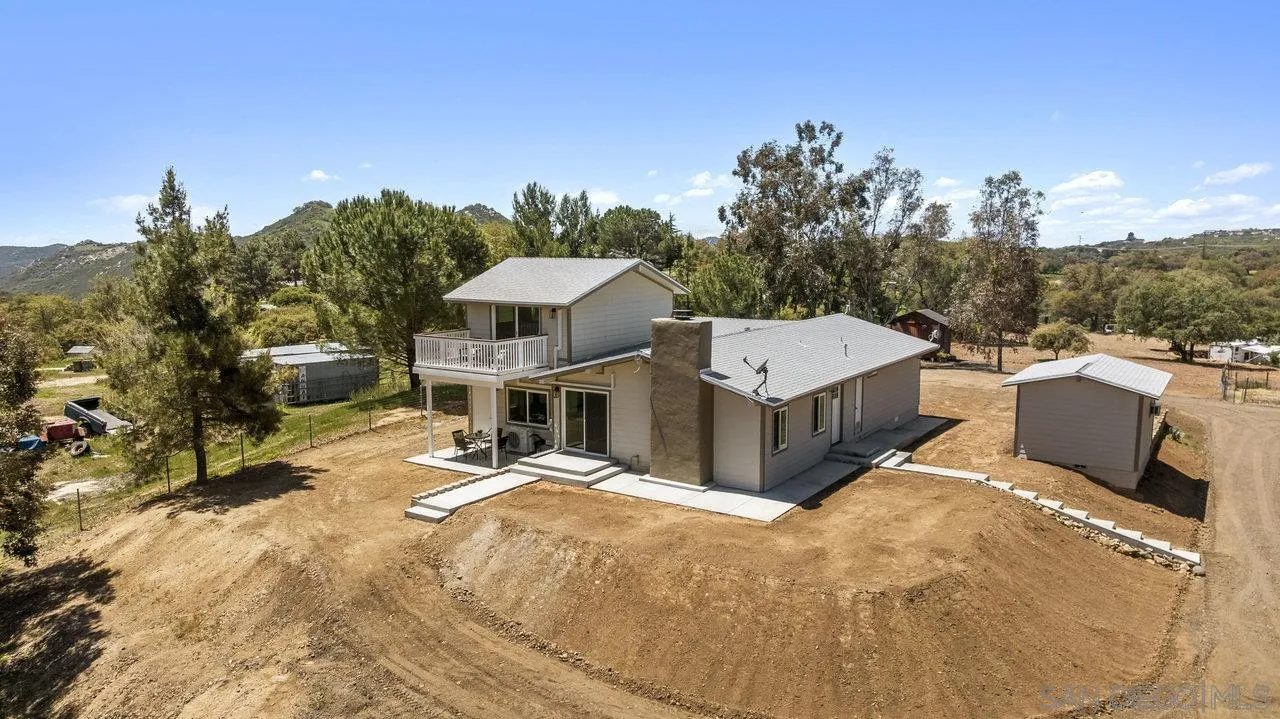 23471 Japatul Valley Road Alpine, CA 91901 - Photo 45 of 57 a view of a house with a outdoor space