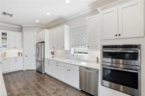 a large kitchen with cabinets