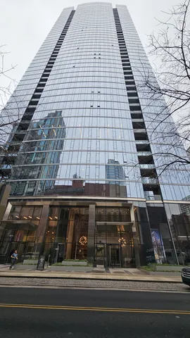 a view of a building on a street