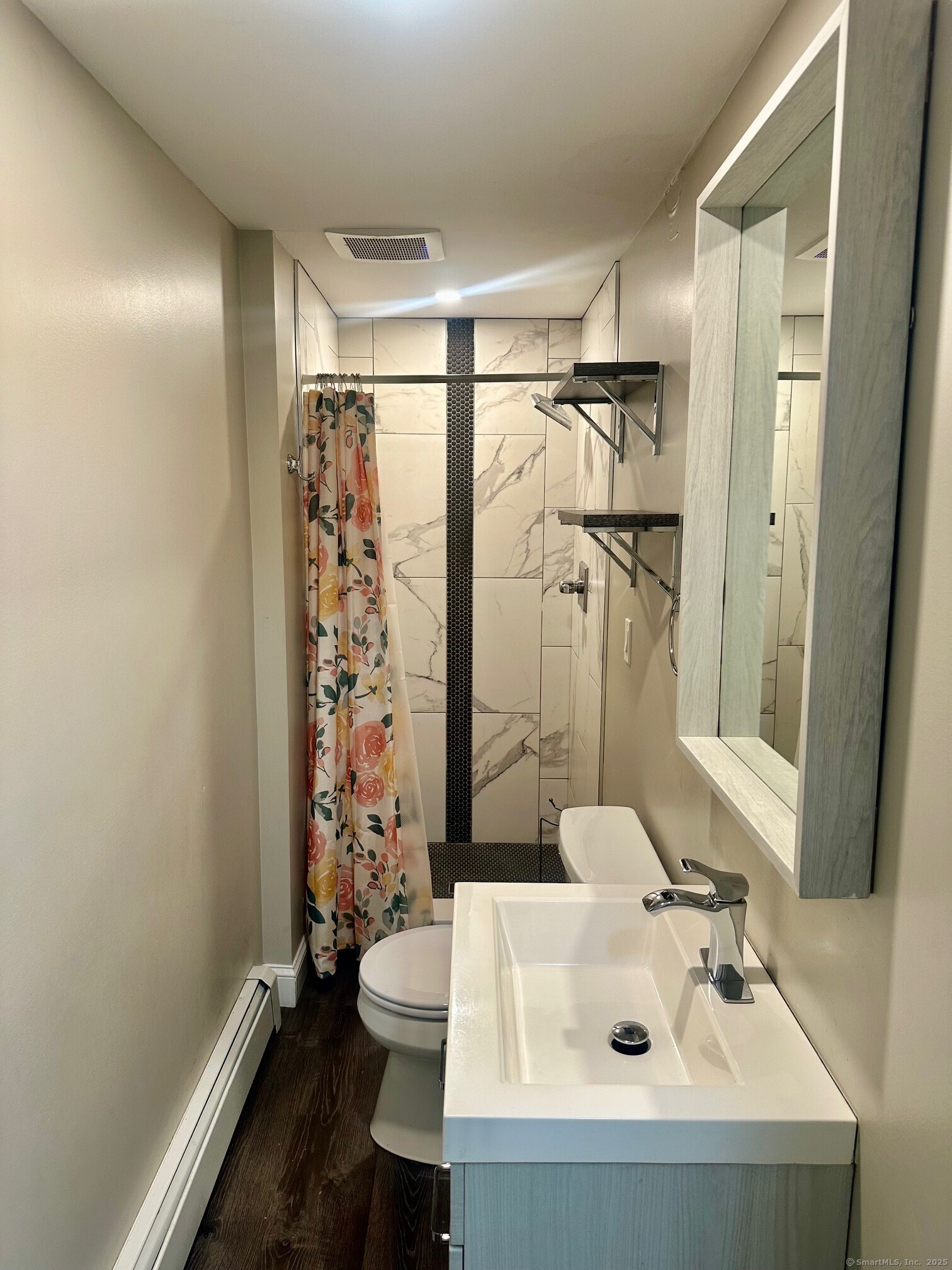 254 Sand Hill Road South Windsor, CT 06074 - Photo 9 of 20 a bathroom with a sink toilet and shower
