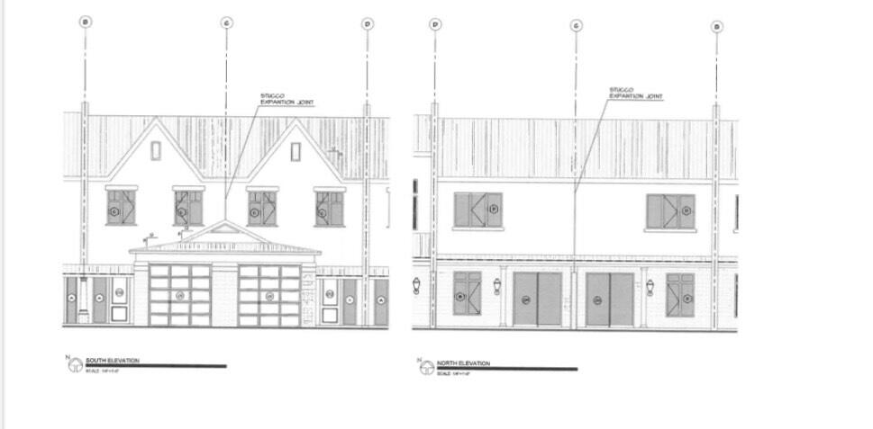 807-809 Airport Road Destin, FL 32541 - Photo 1 of 4 a black and white photo of a black building