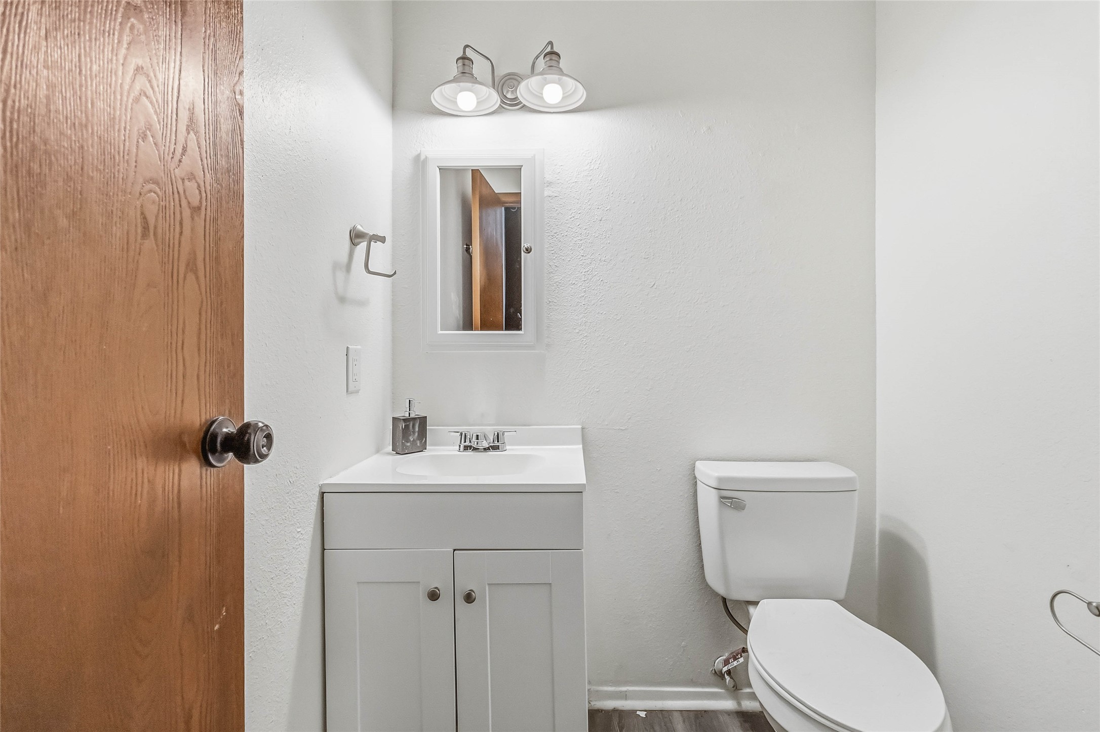805 Indiana Street San Marcos, TX 78666 - Photo 16 of 39 Half bath off of primary bedroom