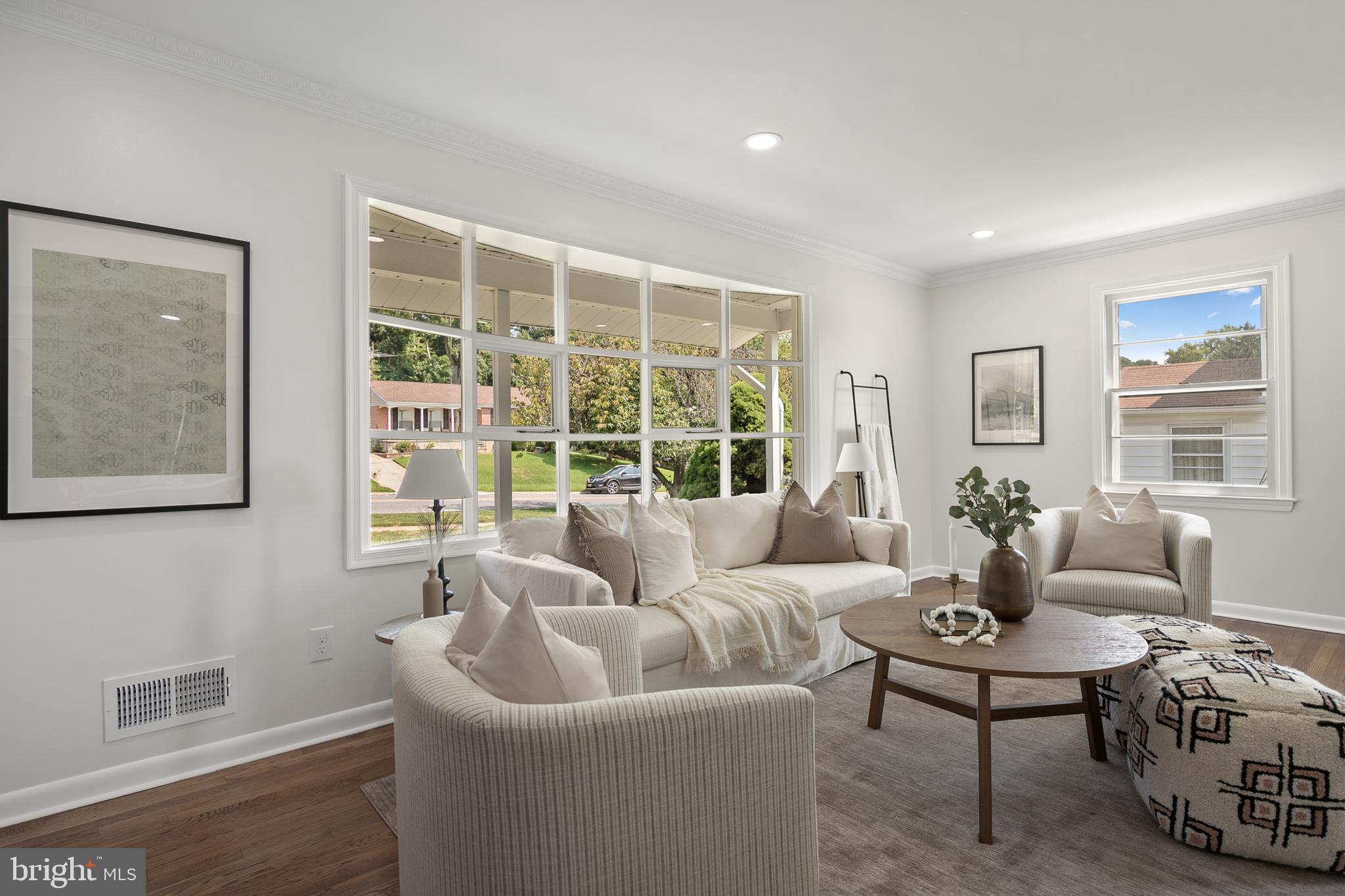 215 East Timonium Road Lutherville-Timonium, MD 21093 - Photo 32 of 33 a living room with furniture and a large window