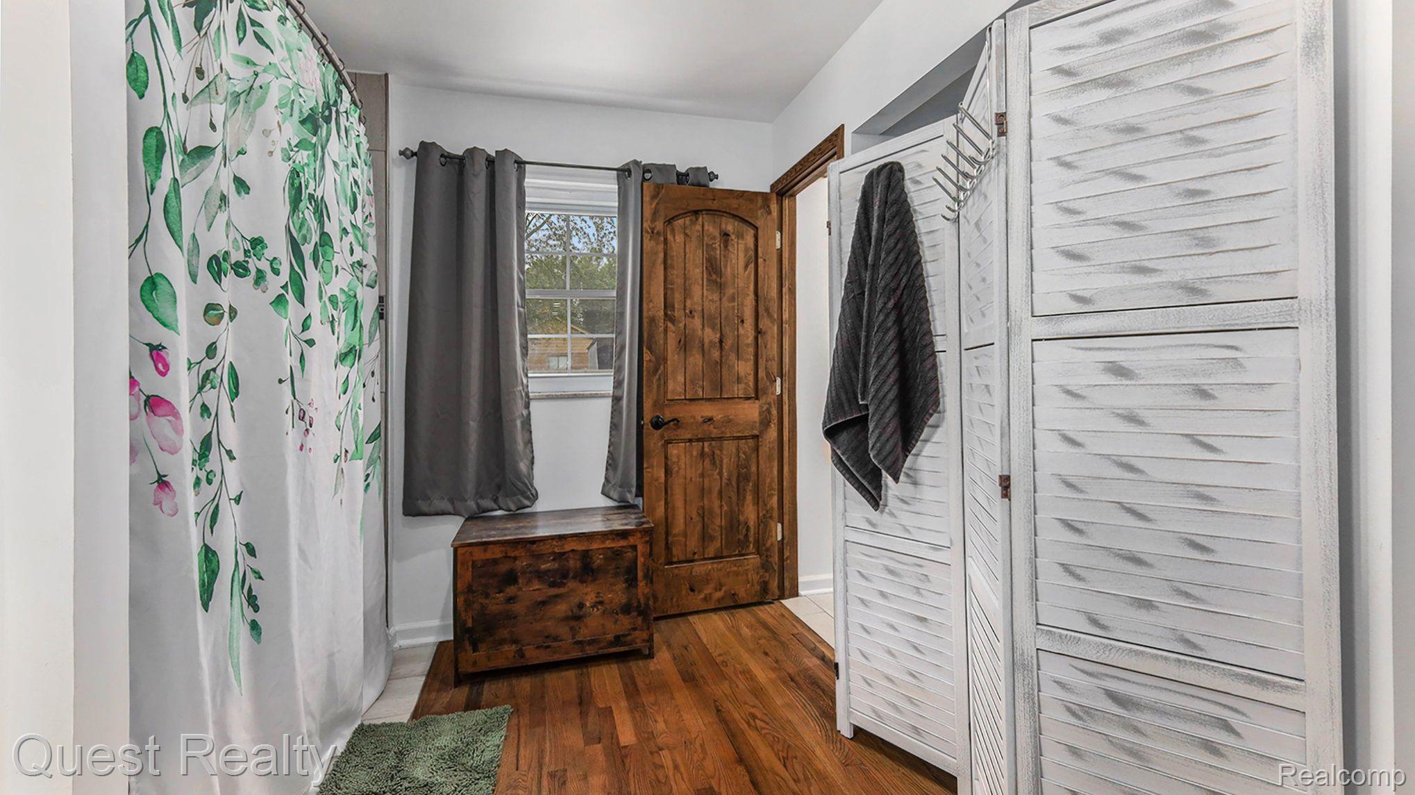 9290 Allen Road Clarkston, MI 48348 - Photo 25 of 56 1st floor full bath is dual entry to bedroom