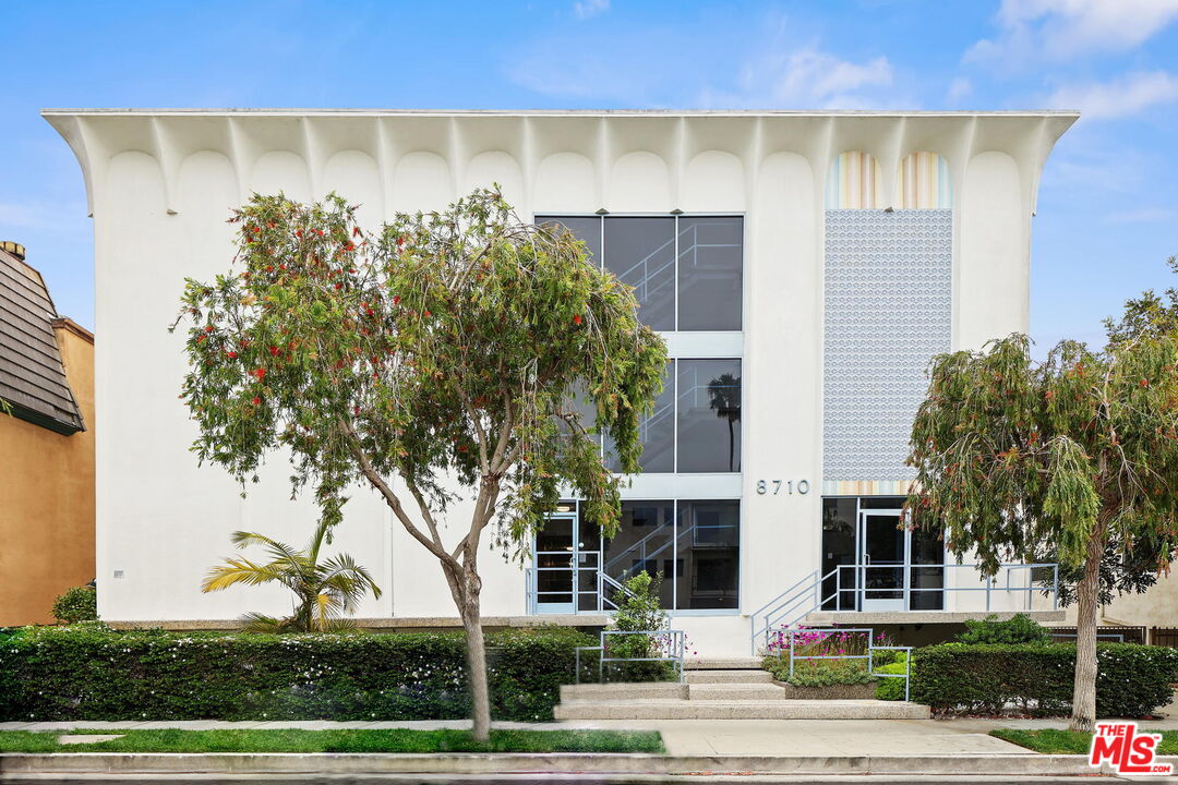 8710 Delgany Avenue, Unit 26 Playa del Rey, CA 90293 - Photo 1 of 25 a front view of a house with garden