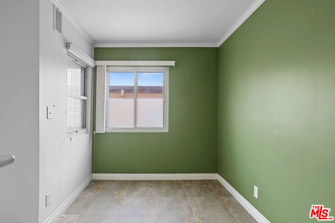 8710 Delgany Avenue, Unit 26 Playa del Rey, CA 90293 - Photo 16 of 25 an empty room with a window