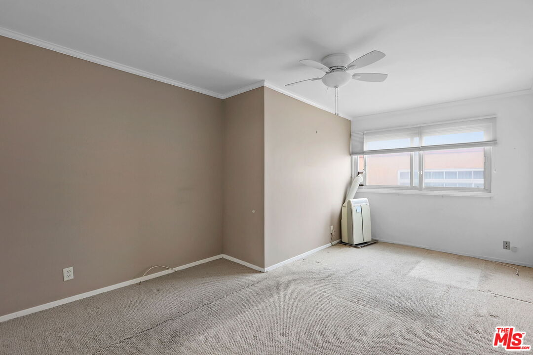 8710 Delgany Avenue, Unit 26 Playa del Rey, CA 90293 - Photo 18 of 25 a view of an empty room with a window