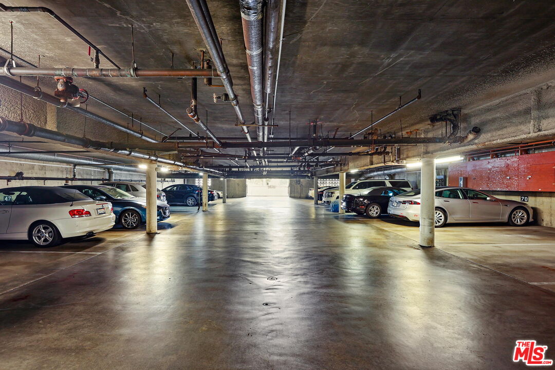 8710 Delgany Avenue, Unit 26 Playa del Rey, CA 90293 - Photo 25 of 25 a view of parking garage with parked car