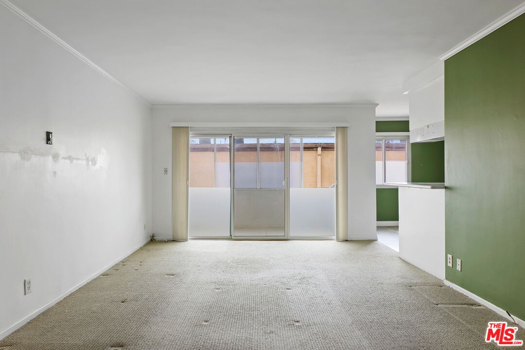 8710 Delgany Avenue, Unit 26 Playa del Rey, CA 90293 - Photo 8 of 25 a view of an empty room with a window