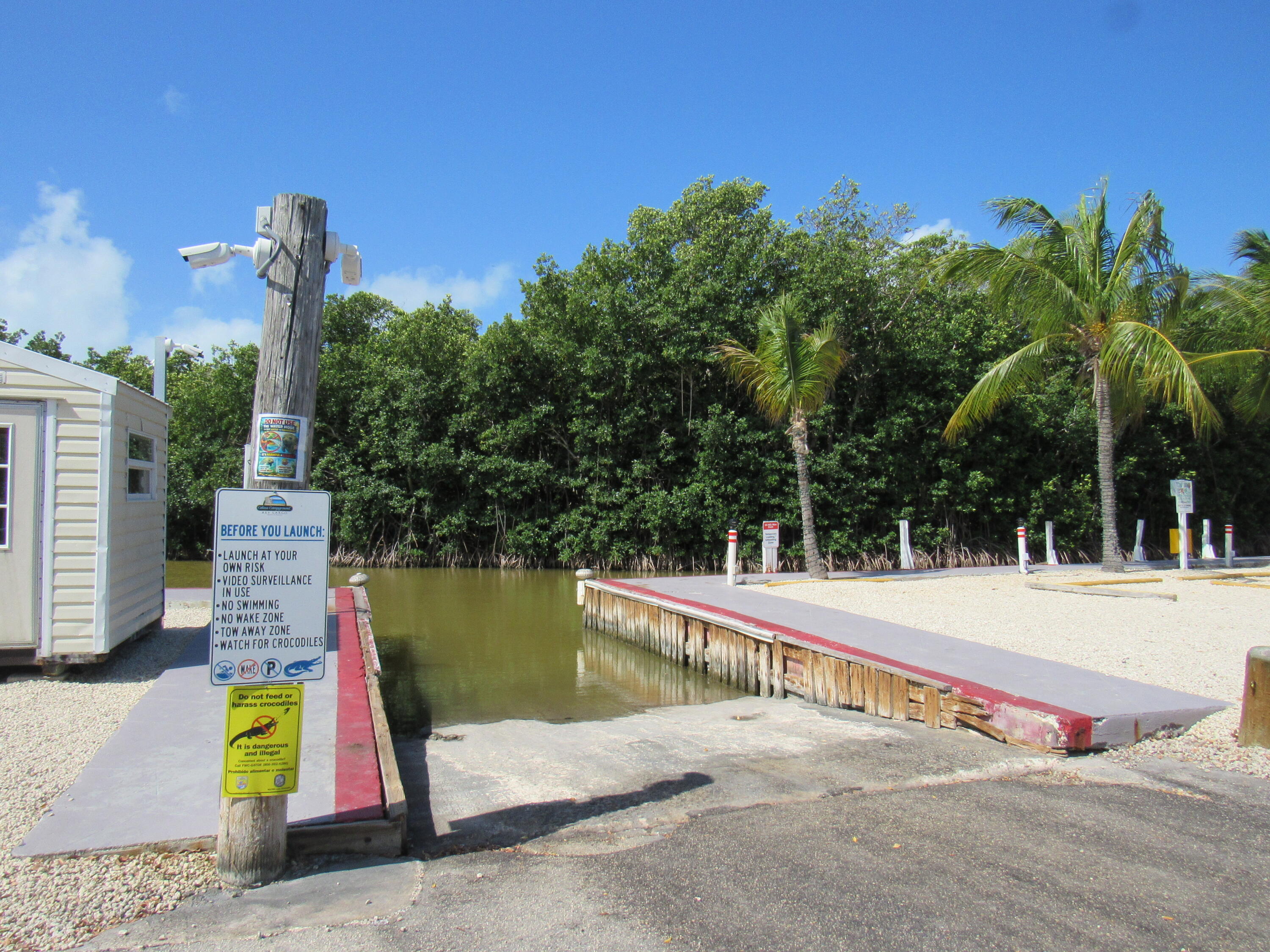 325 Calusa Street, Unit 15 Key Largo, FL 33037 - Photo 19 of 32 a view of a swimming pool with a patio