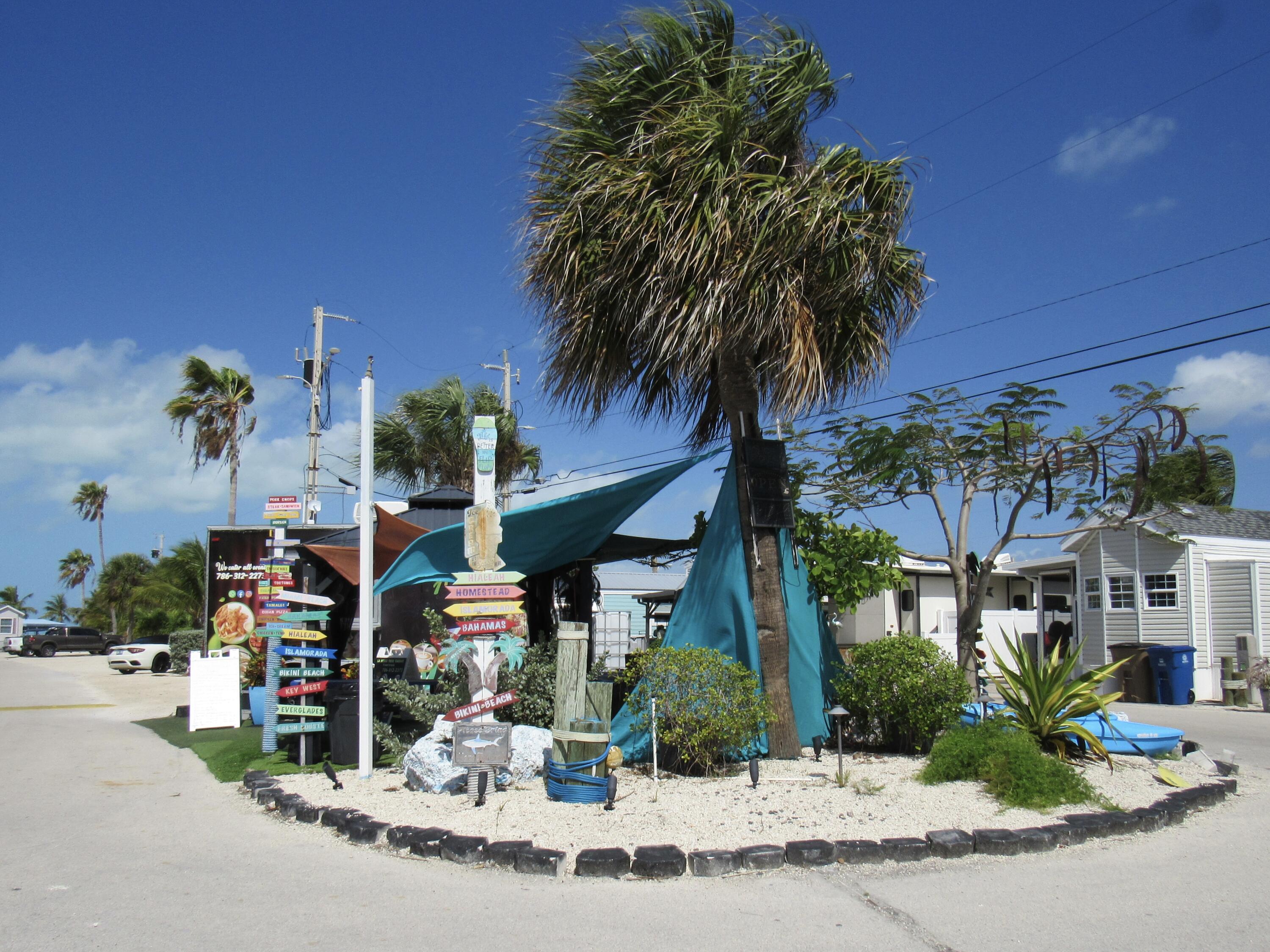 325 Calusa Street, Unit 15 Key Largo, FL 33037 - Photo 23 of 32 a front view of a building with street
