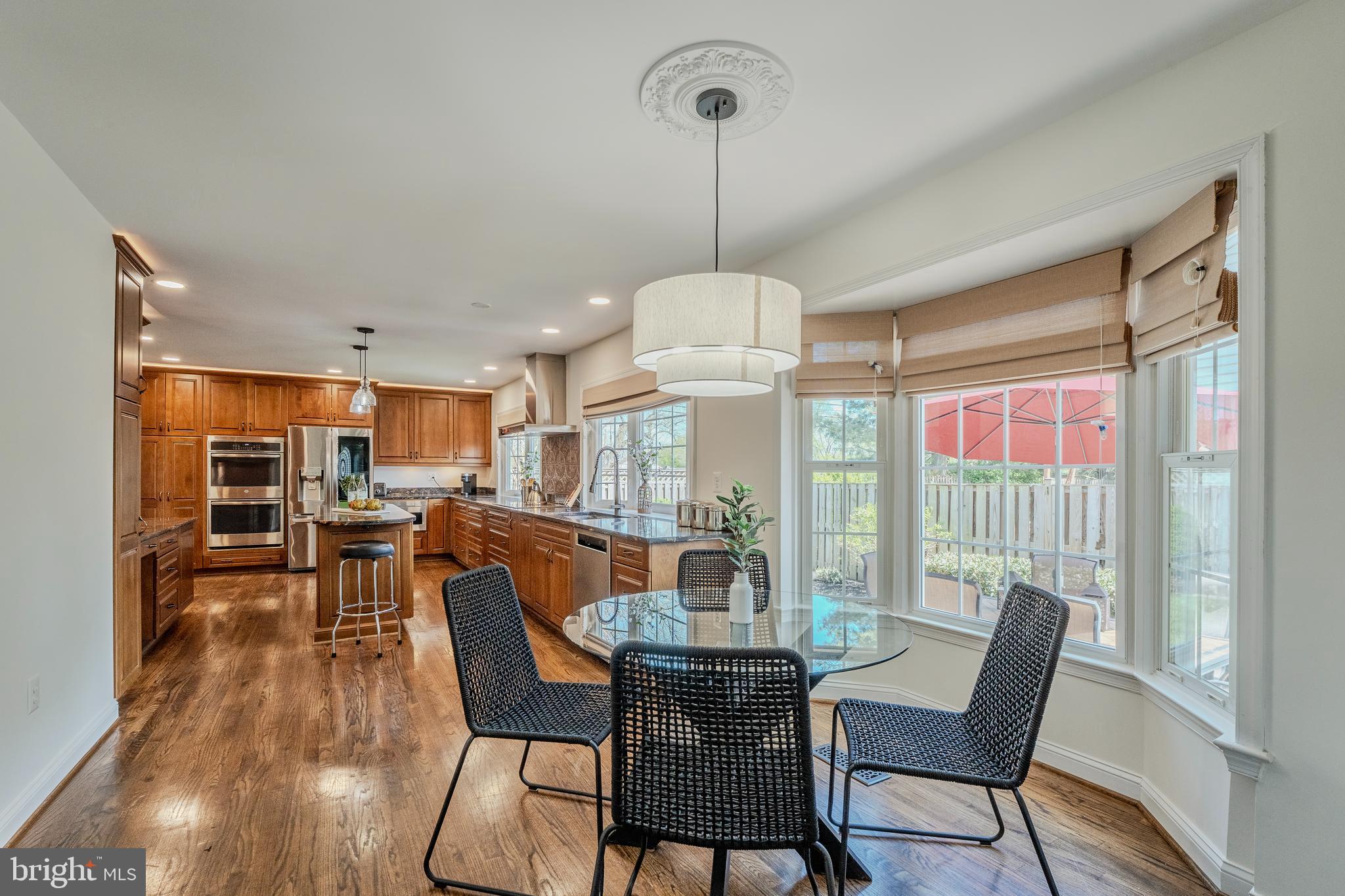 a view of a dining room with furniture window and outside view