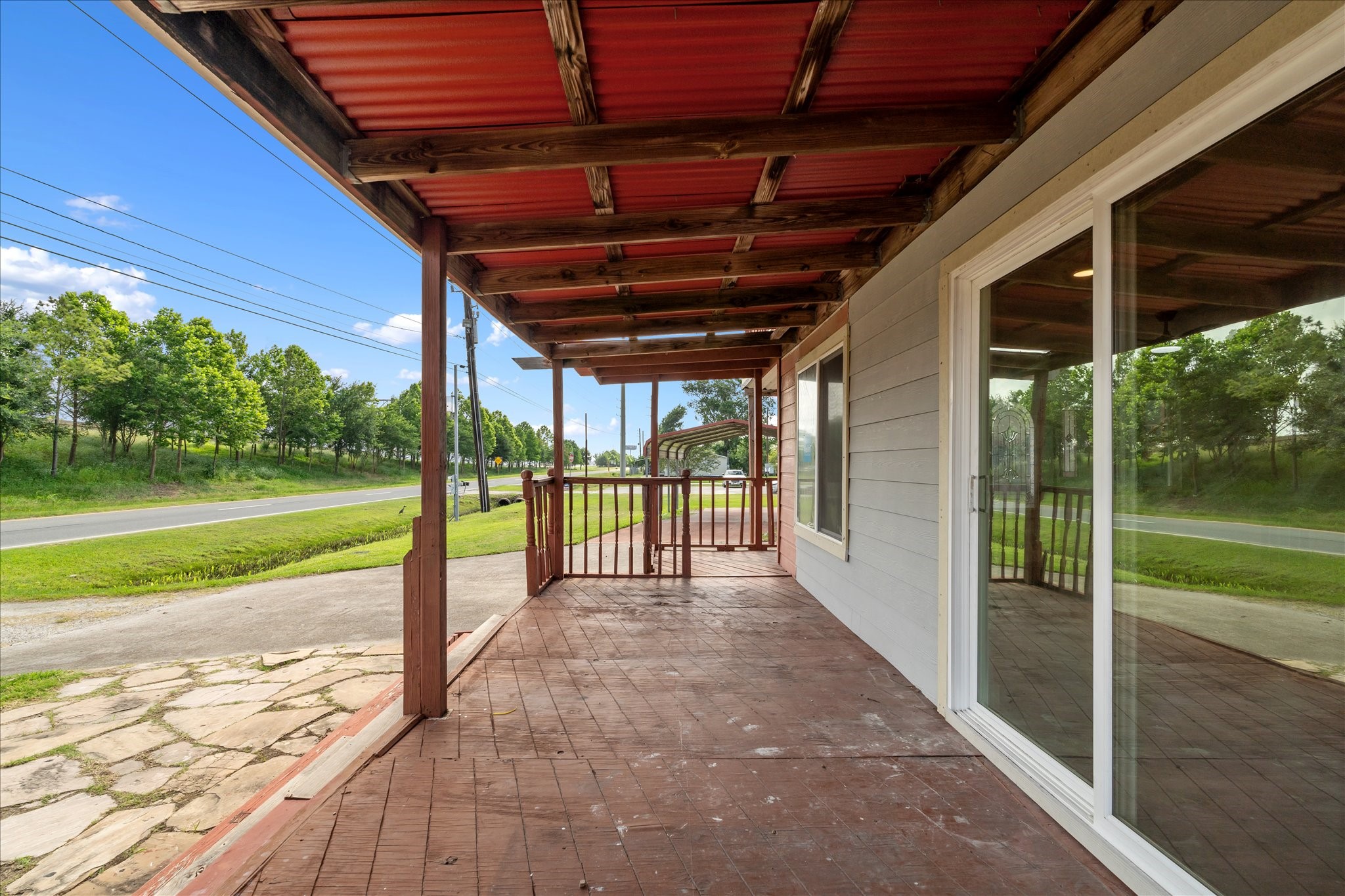 7104 Dallas Street, Unit 1 Baytown, TX 77521 - Photo 17 of 17 a view of a porch